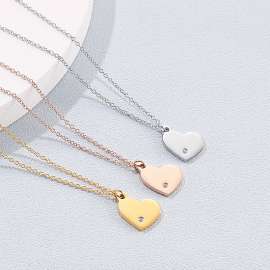 Mirror-polished heart-shaped pendant with diamond-encrusted clavicle chain